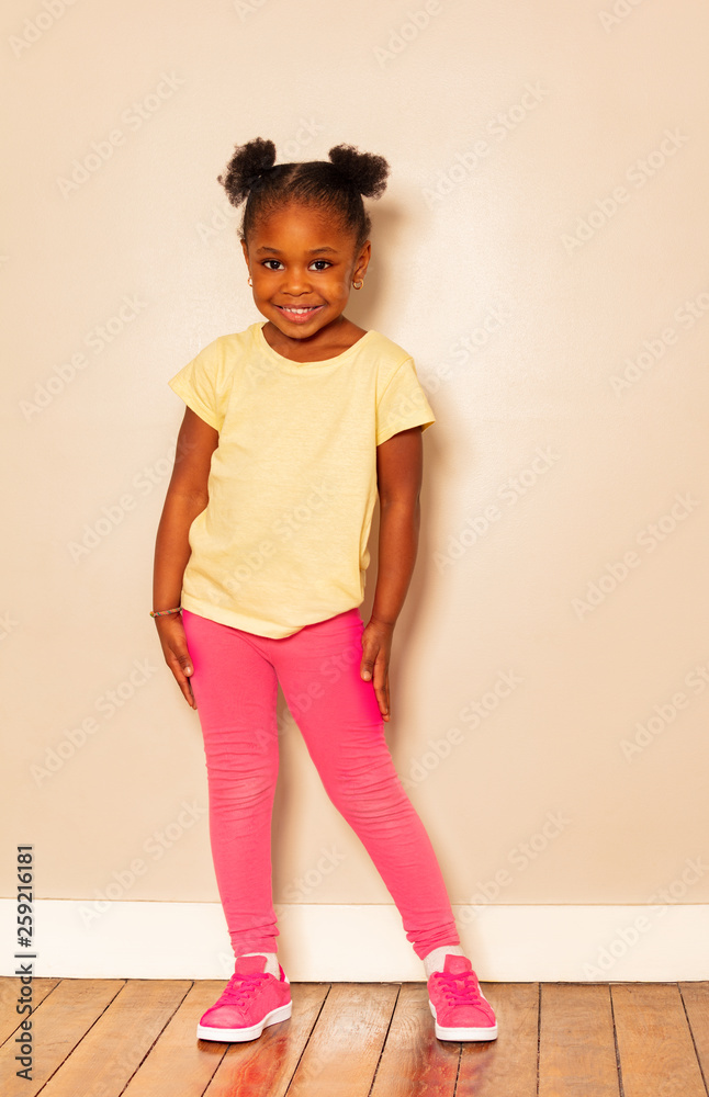 Full height portrait of nice little black girl