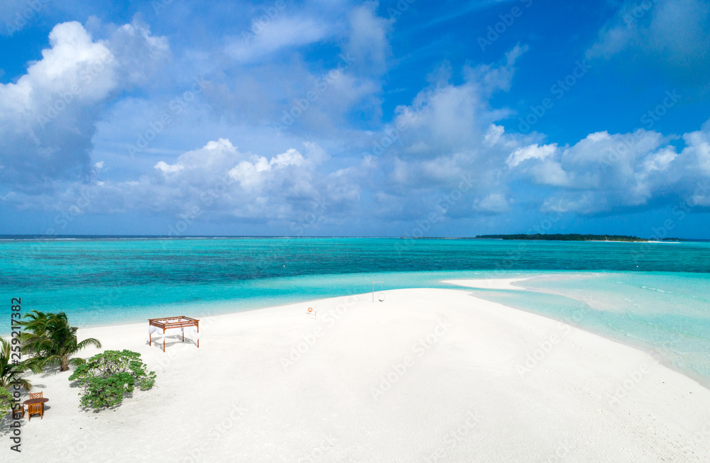 Beautiful aerial view of Maldives and tropical beach . Travel and vacation concept Beautiful aerial view of Maldives and tropical beach . Travel and vacation concept