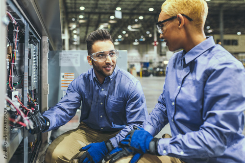 Service technicians inspecting equipment