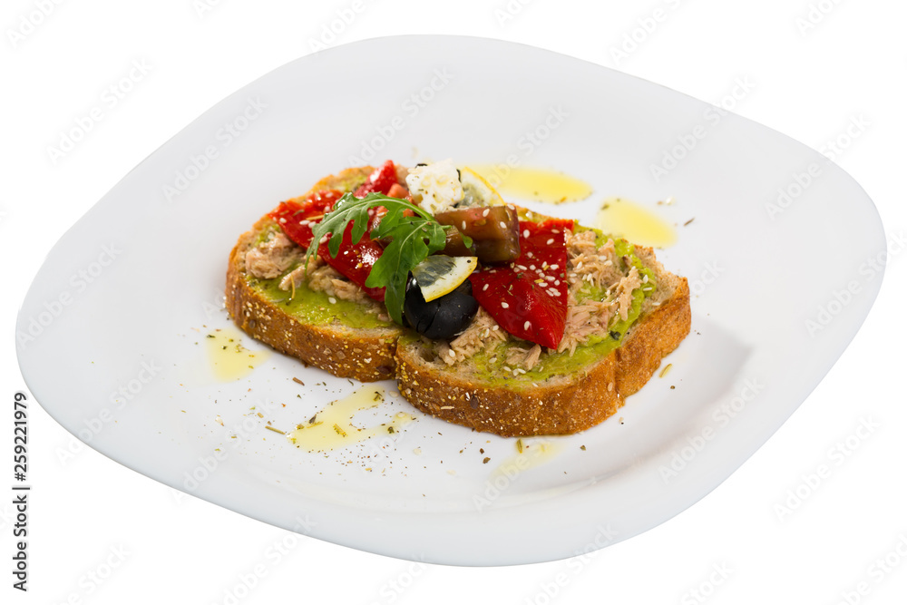 Sandwiches with guacamole, canned fish, pepper, feta