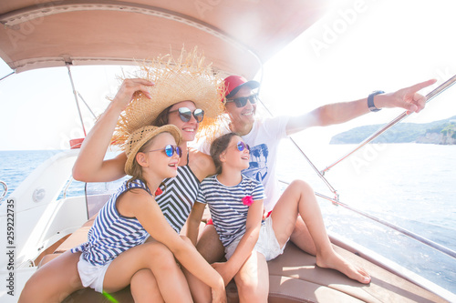 family on sea yacht