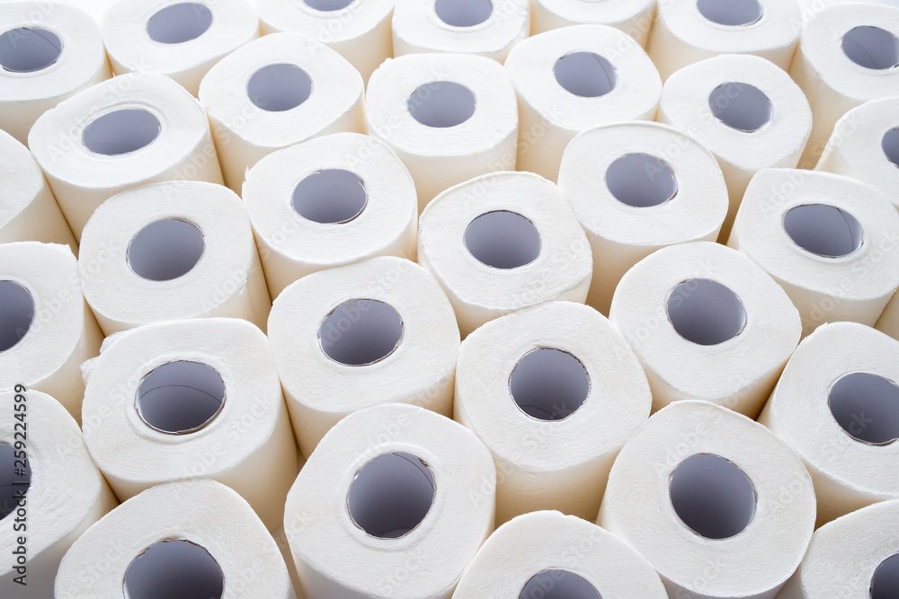 lots of toilet paper rolls. soft hygienic paper. close up lots of toilet paper rolls. soft hygienic paper. close up