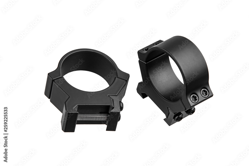 Obraz premium Quick disconnect mount made for holding a scope on a rifle isolated on white back. Quick Release Sniper Cantilever Scope Mount.