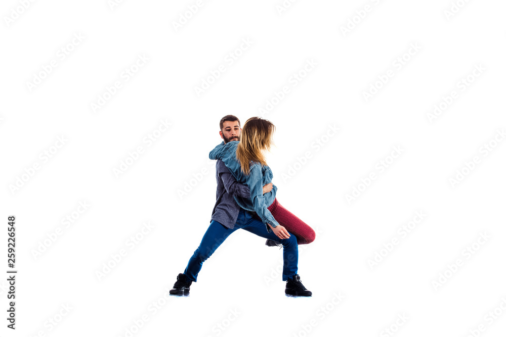 Man and his girlfriend doing breakdance