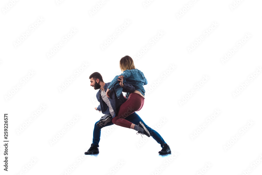 Girl and boy doing breakdance