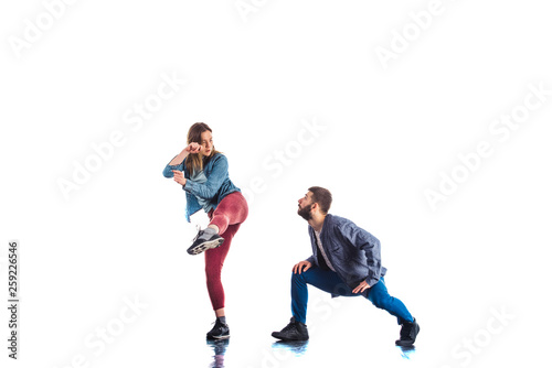 Two people having fun isolated on white © qunica.com