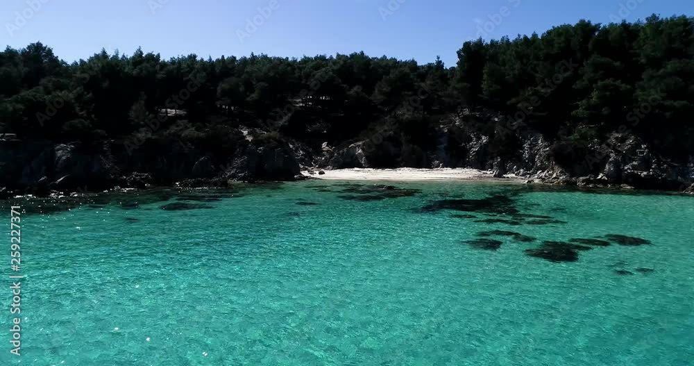 Aerial flight with drone over the Kavourotrypes or Orange is a small paradise of small beaches located between Armenistis and Platanitsi in Sithonia, Chalkidiki, Greece Aerial flight with drone over the Kavourotrypes or Orange is a small paradise of small beaches located between Armenistis and Platanitsi in Sithonia, Chalkidiki, Greece
