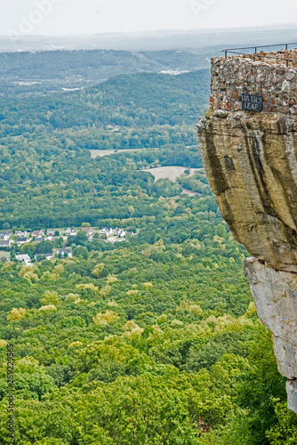 Flag flying on the top of Chimney Rock State Park. photo