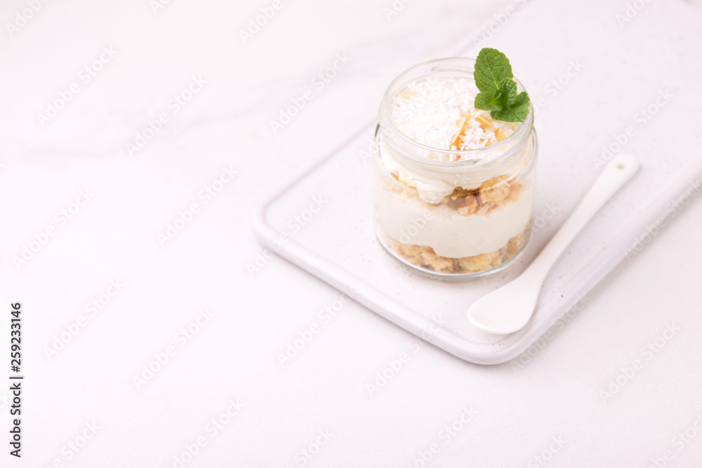 Coconut bisquit dessert with ricotta, mint. Yogurt breakfast Coconut bisquit dessert with ricotta, mint. Yogurt breakfast