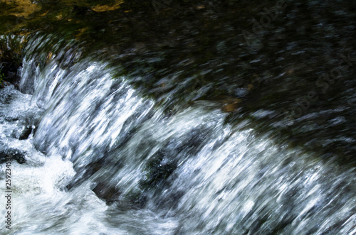 water flowing over rocks