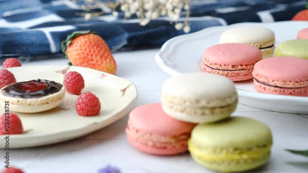 Colorful French macarons cakes desert set on party table. Colorful French macarons cakes desert set on party table.