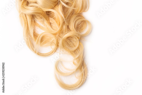 uman, natural light blond wavy hair on white isolated background. An example of a fashionable hairstyle for a poster, an advertisement or a hairdressing website. Extended, attached and beauty.