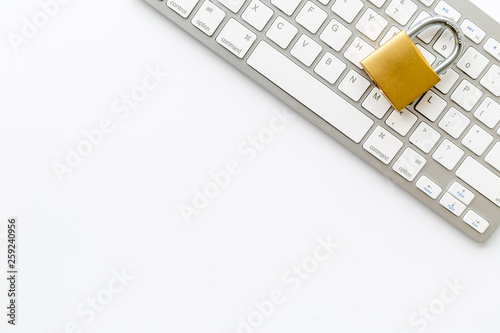 protect information from cyber attack with locker and keyboard on white background top view mock-up
