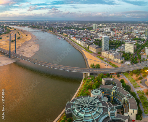 Sunset aerial view of Dusseldorf with Rheinkniebrucke bridge in Germany. photo