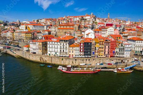 Porto Cityscape with Dom Luis I Bridge over Douro River and medieval Ribeira district at day time, Portugal © -Marcus-