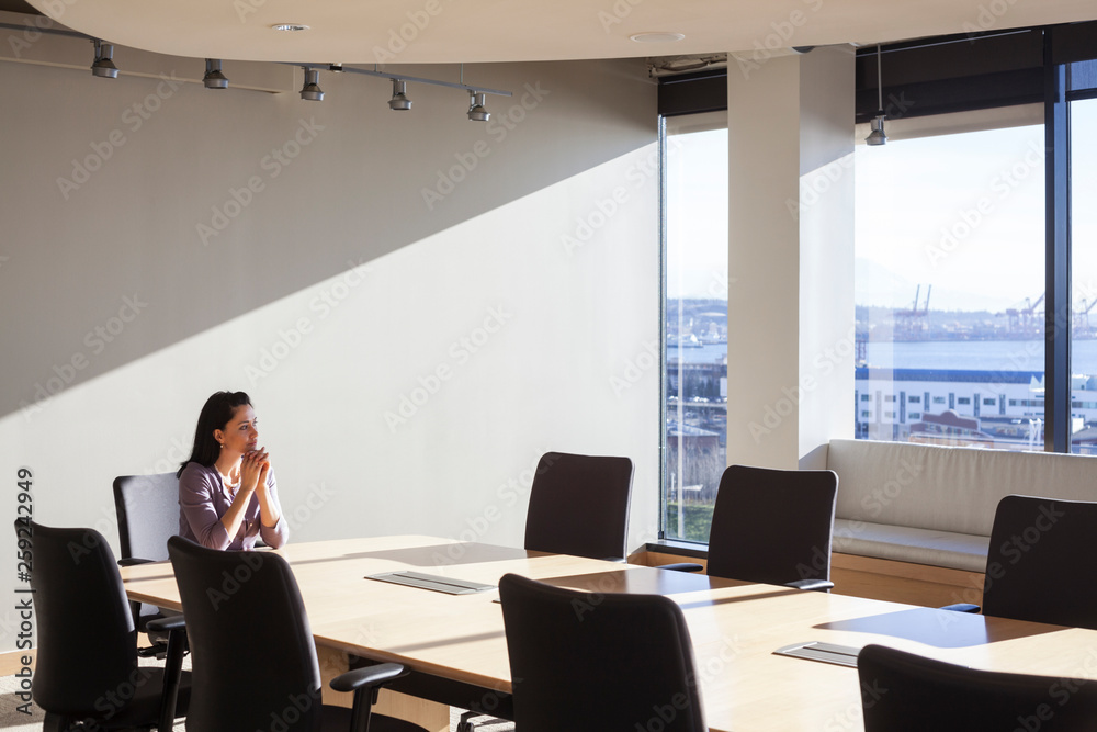 Female executive at conference table Female executive at conference table