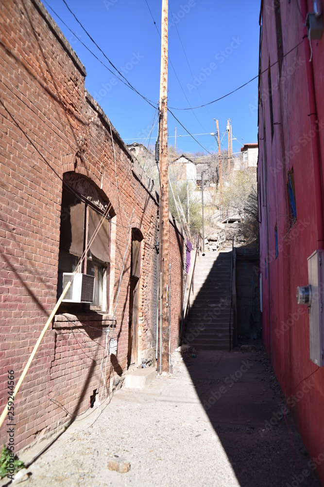 Fototapeta premium Miami, Arizona. U.S.A. January 30, 2018. Arizona copper mining ghost-town in ruins: boom 1910 to bust 1950s. Time, weather, fire and vandalism brought blight that shuttered Miami’s buildings, homes
