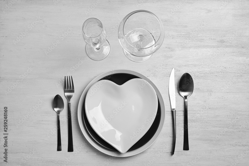 Stylish elegant table setting on wooden background, top view Stylish elegant table setting on wooden background, top view