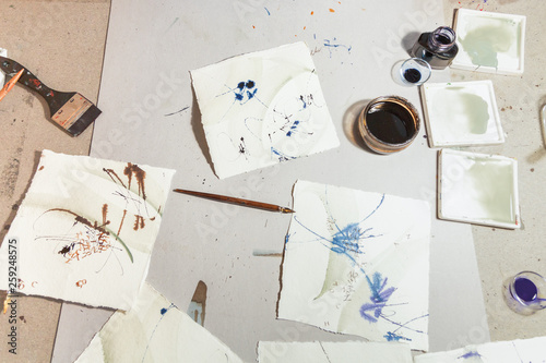 A calligrapher creating artworks in his workshop
