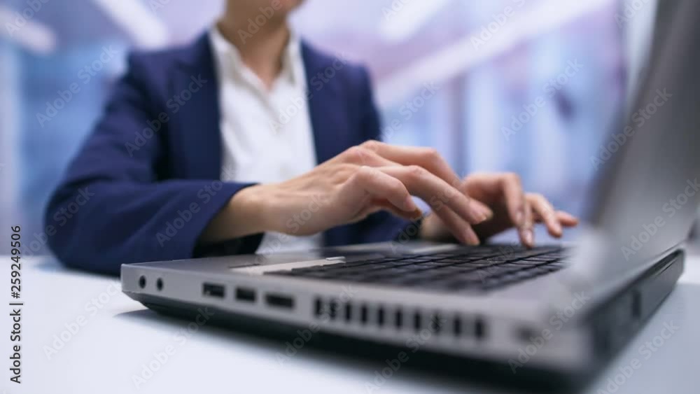 Woman typing laptop keyboard closeup, journalist writing article, texting email