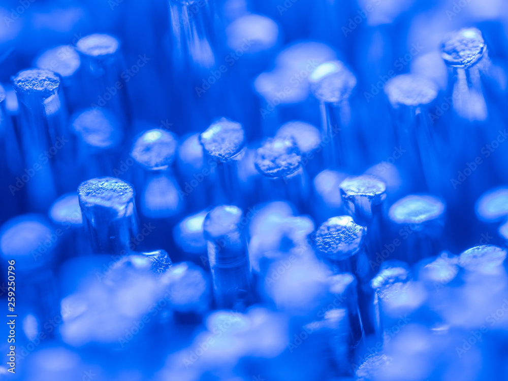 © Pixel Stories/Stocksy - Fiber optic threads super macro
