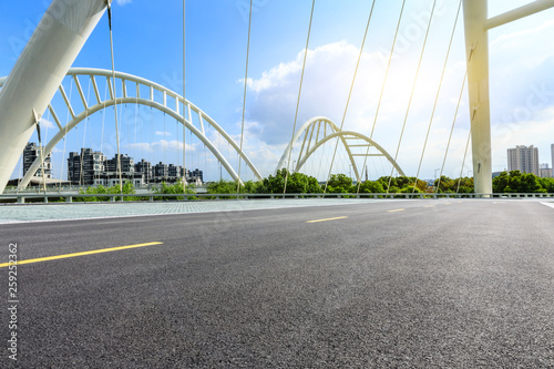 Empty asphalt road and bridge construction in shanghai