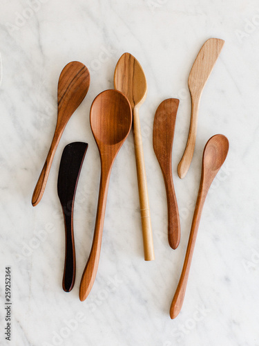 Wooden spoons on marble countertop