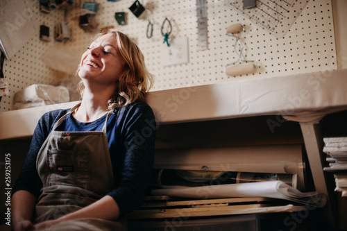 Beautiful Potter Smiling in her Studio photo