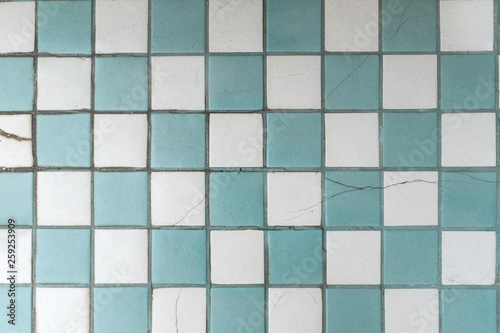 Vintage checked tile floor. photo