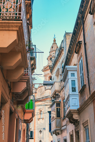 Streets of Luqa and St Andrew's Parish Church, Malta photo