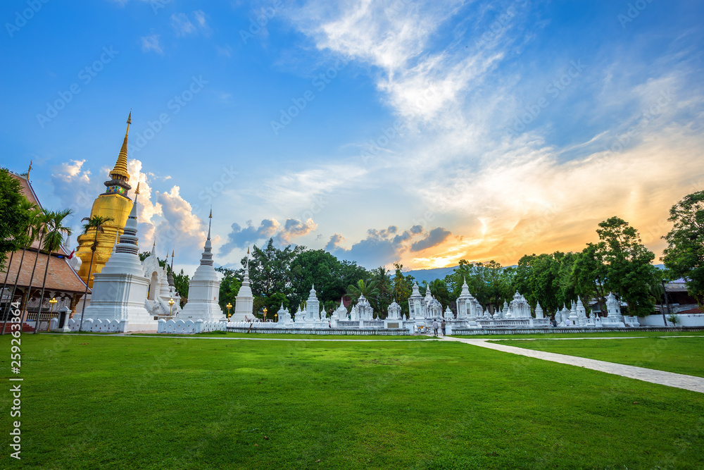 Wat Suan Dok is a Buddhist temple (Wat) at sunset sky is a major tourist attraction in Chiang Mai,Thailand.