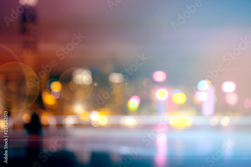 Abstract colorful circular bokeh with city background