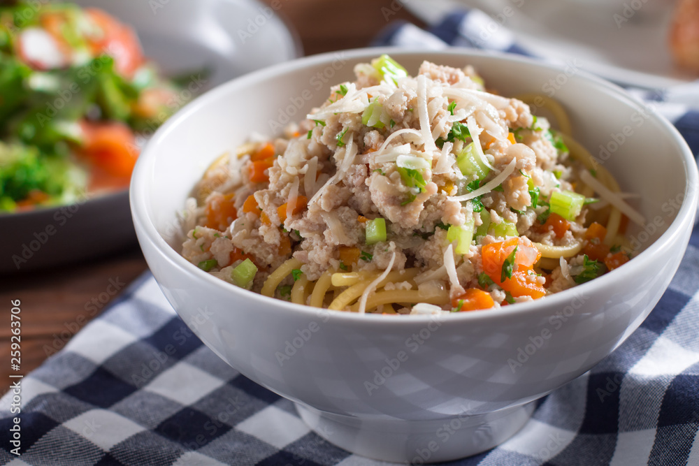 Spaghetti with rabbit sauce, typical Italian pasta, close-up Spaghetti with rabbit sauce, typical Italian pasta, close-up