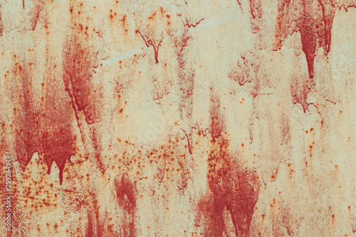 Rusty metal texture with natural defects. Scratches, grungy, cracks, corrosion. Can be used as a background or poster for an inscription. © INTHEBLVCK