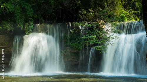 Beautiful waterfall in natural 'Si Dit Waterfall' with blue sky in khao kho national park 