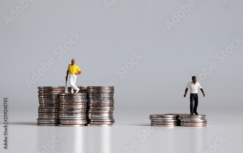 Coins and miniature people. 