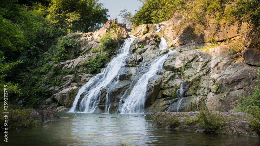 Beautiful waterfall in green forest