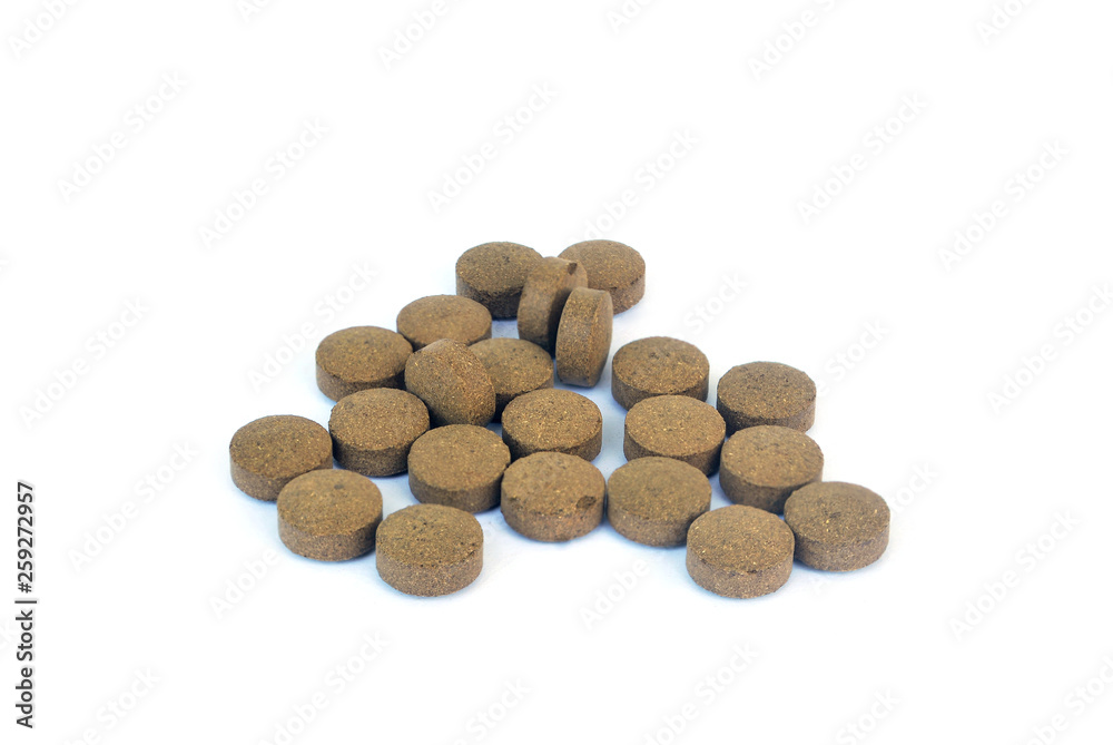 Thai herbal medicine tablets on white background. Thai herbal medicine tablets on white background.