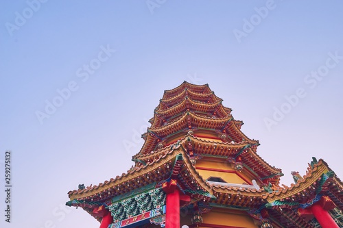 Kaohsiung, Taiwan - December 3, 2018: The Two tower of Dragon and Tiger Pagodas on lotus pond in sunset time at Zuoying district, Kaohsiung city, Taiwan.