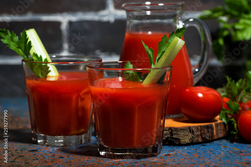 fresh tomato juice in glass cups, closeup