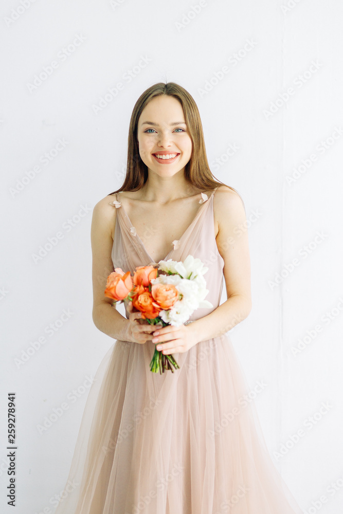 Wedding decor and minimalism. A bright modern bouquet on a white background. Wedding decor and minimalism. A bright modern bouquet on a white background.