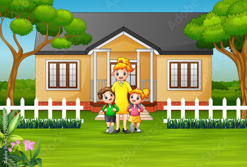 Mother and children in front a house