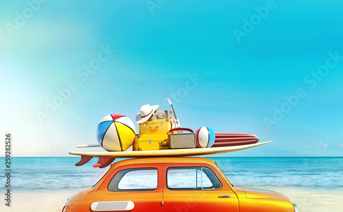 Small retro car with baggage, luggage and beach equipment on the roof, fully packed, ready for summer vacation, concept of a road trip with family and friends