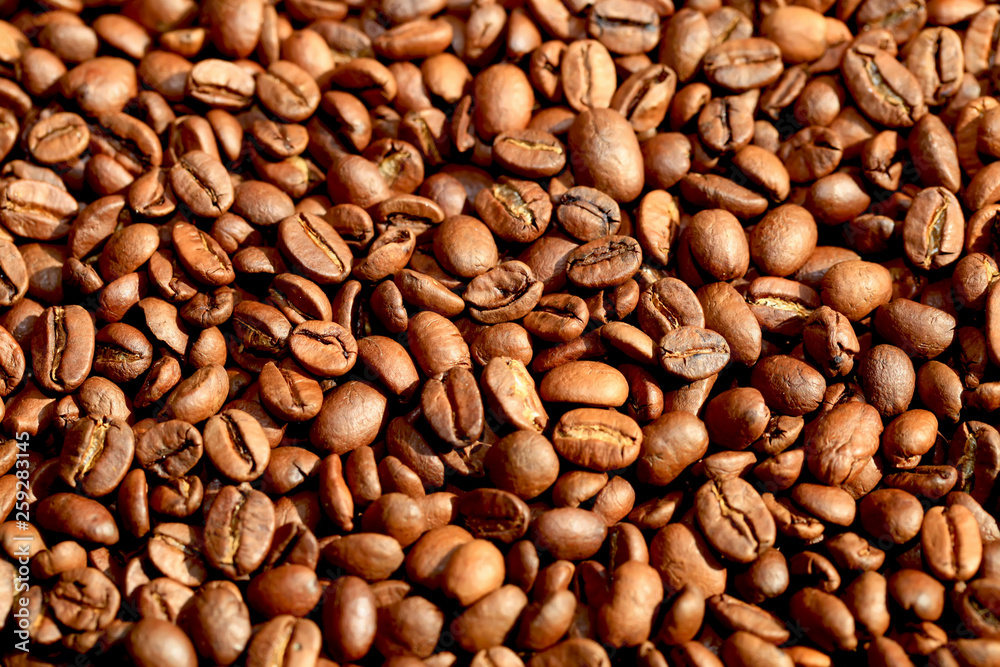 Fried coffee beans close-up - excellent morning breakfast. Black Espresso. Fried coffee beans close-up - excellent morning breakfast. Black Espresso.