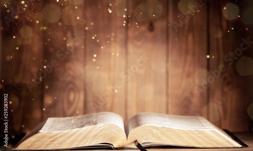 Holy Bible  book on a wooden background