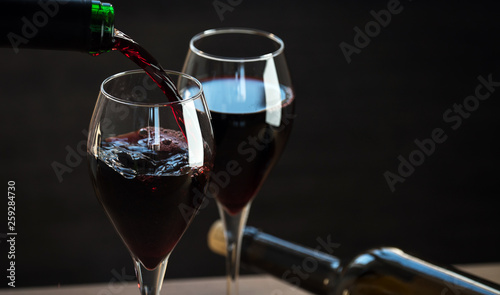 Pouring red wine 