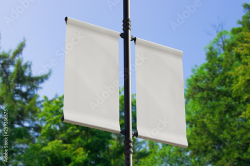 3D rendering of blank flag banner (empty advertisement) with clouds. Empty mockup template