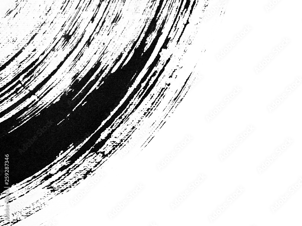 Obraz premium Paintbrush Black Ink Splash on white paper abstract background.