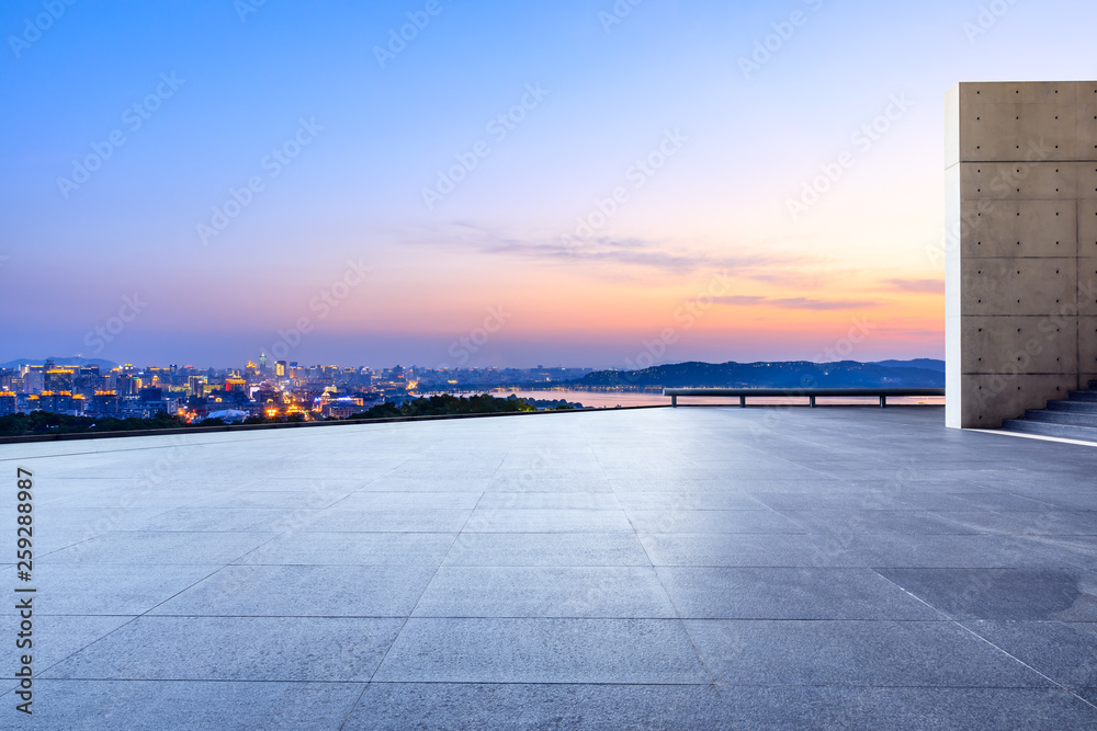 Empty square floor and beautiful city scenery with mountain in Hangzhou