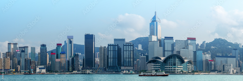 landscape scenery of skyscrapers over Victoria bay Hong Kong - obrazy, fototapety, plakaty 
